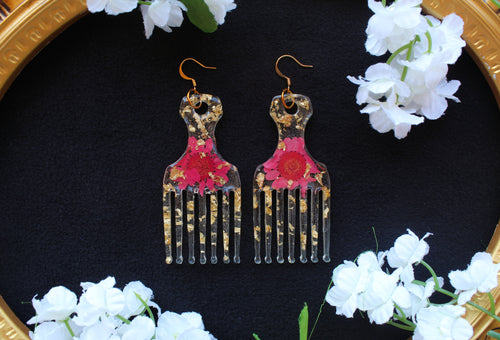 Red Afro pick earrings