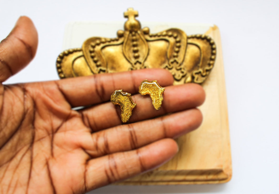 Small africa shaped polymer clay studs | Shimmery gold Africa stud earrings
